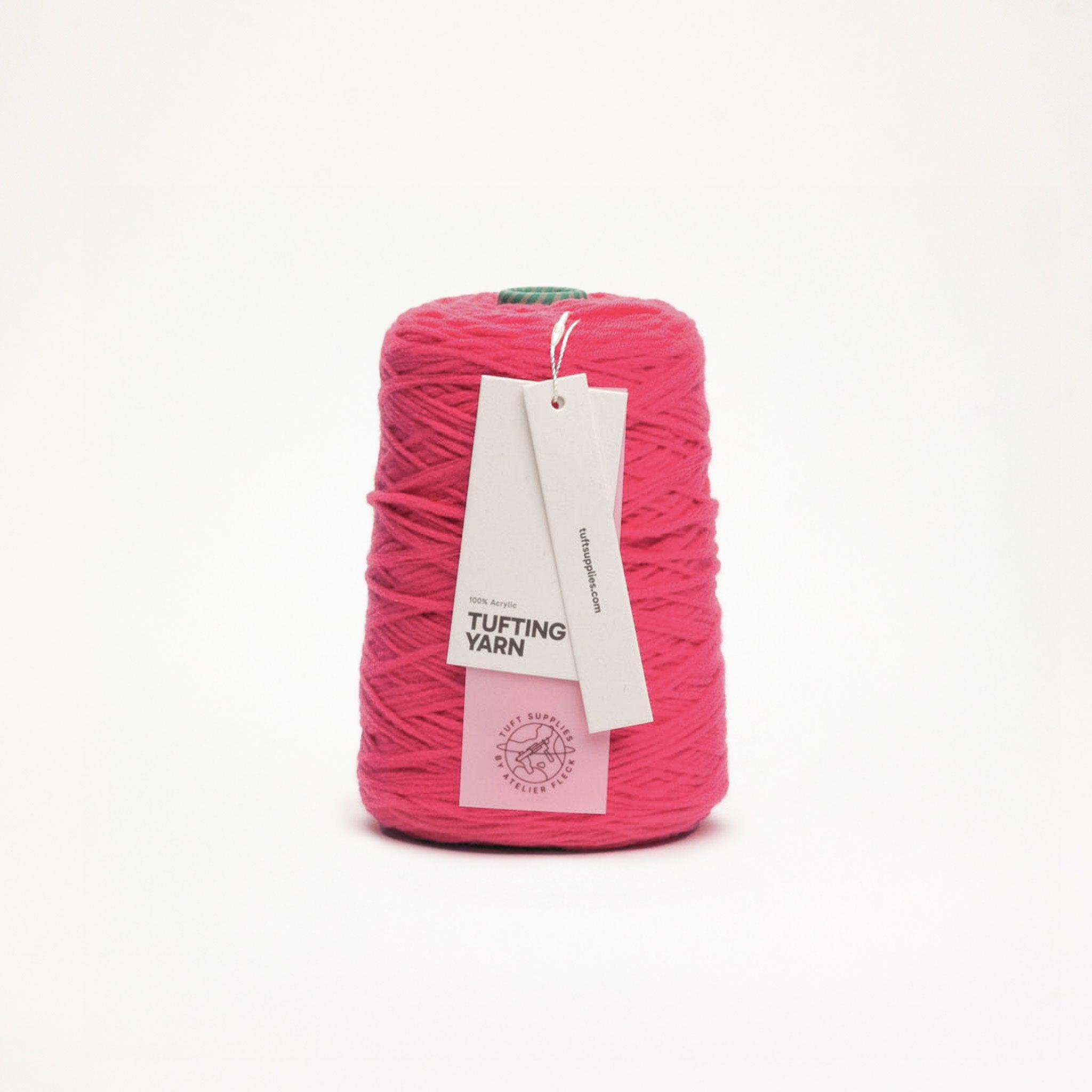 Coral Bloom yarn in a bright tone shade (Hex: #dc5168), suitable for tufting and punch needle projects.