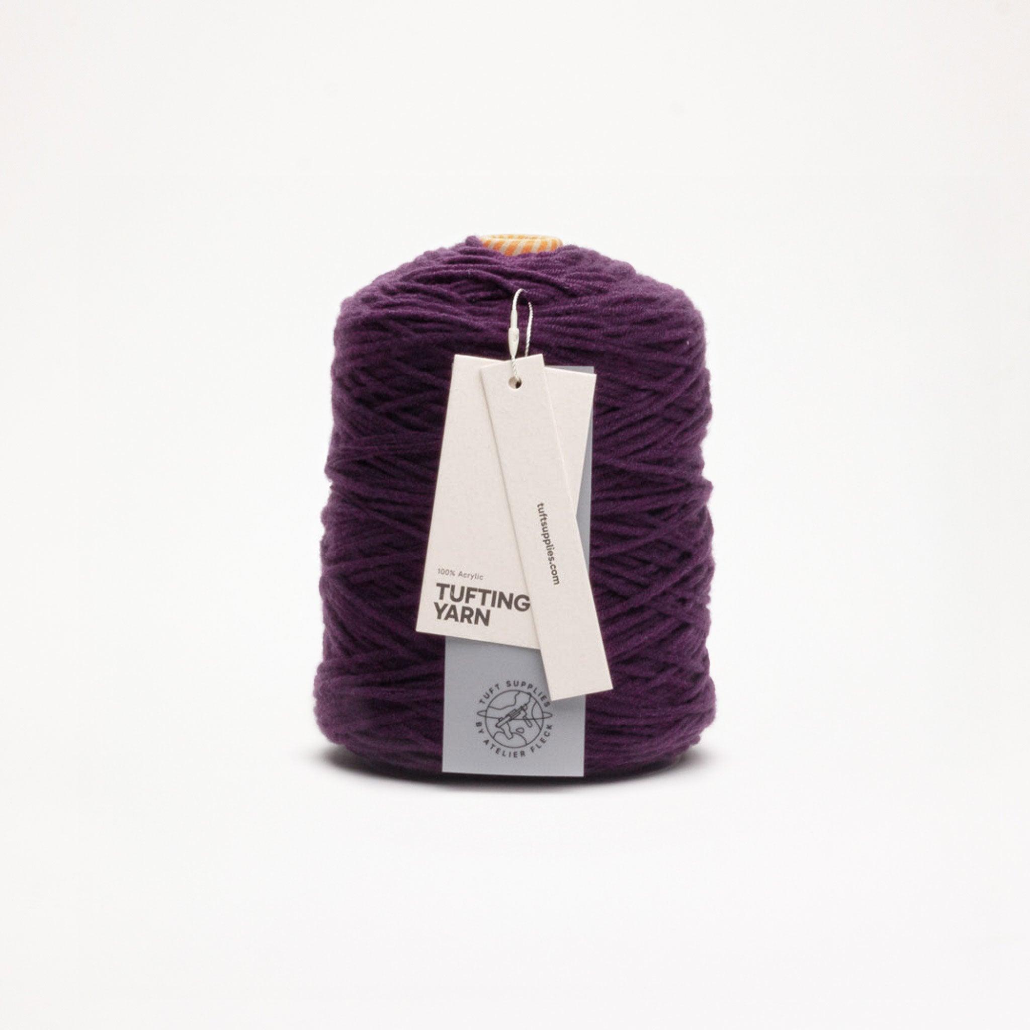 Plumwood yarn in a cold tone shade (Hex: #5b3354), suitable for tufting and punch needle projects.