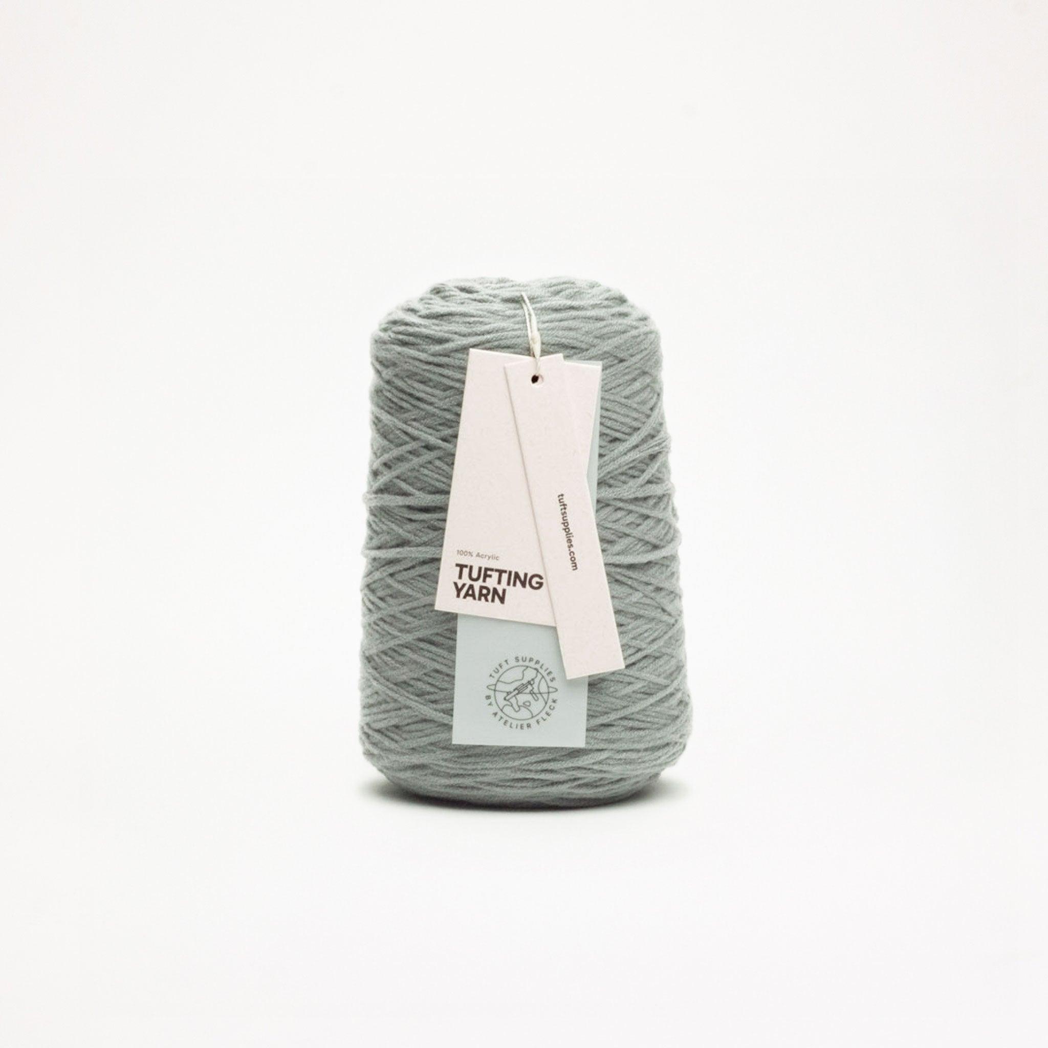 Mossy Mist yarn in a neutral tone shade (Hex: #8b8e87), suitable for tufting and punch needle projects.