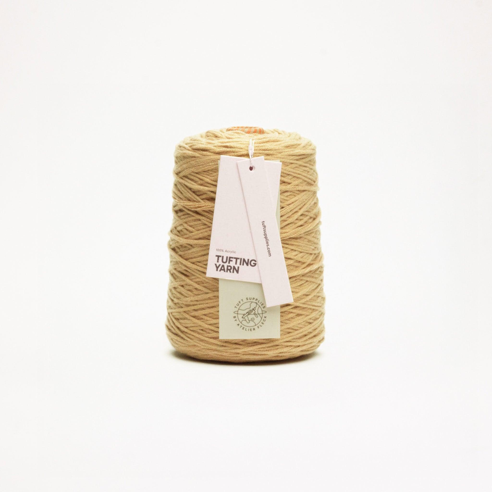 Wheat Gold yarn in a warm tone shade (Hex: #cfb079), suitable for tufting and punch needle projects.