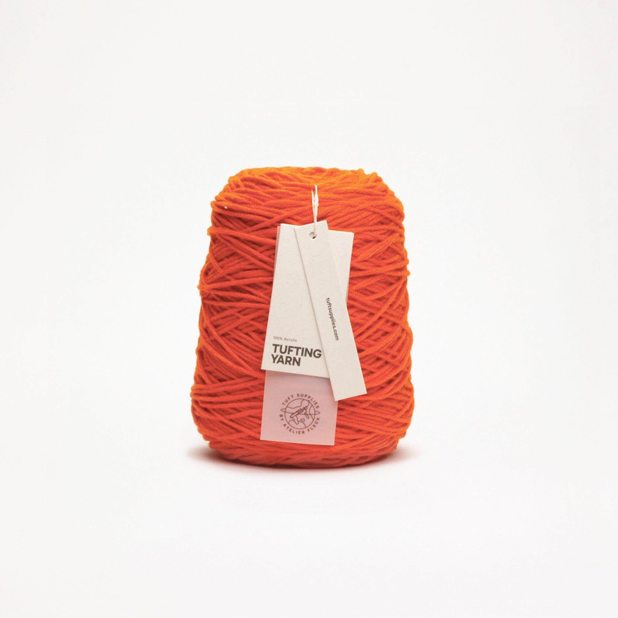 Terracotta Flame yarn in a warm tone shade (Hex: #d25037), suitable for tufting and punch needle projects.